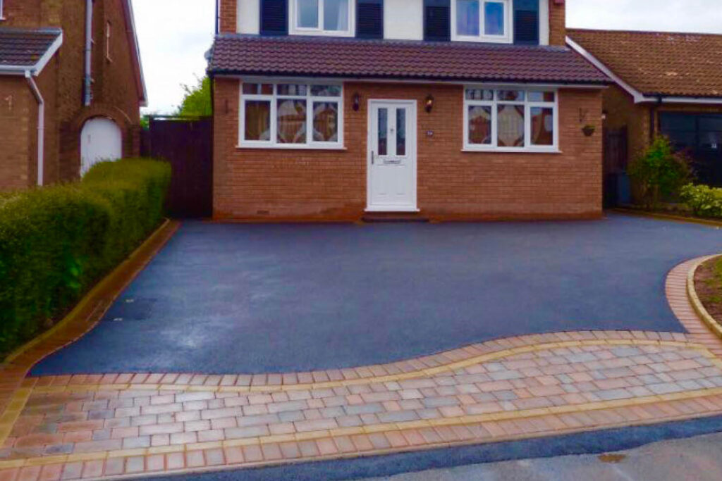 fancy block paving edge and tarmac drive
