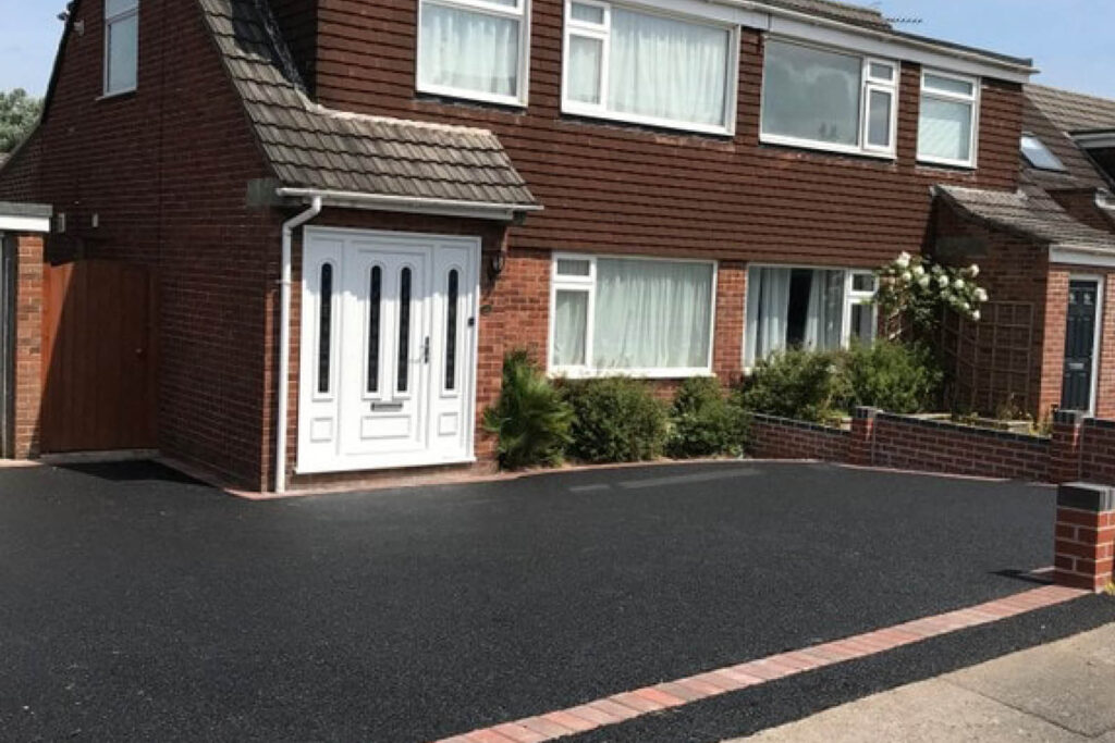 full width ashphalt driveway for customer in Radmanthwaite